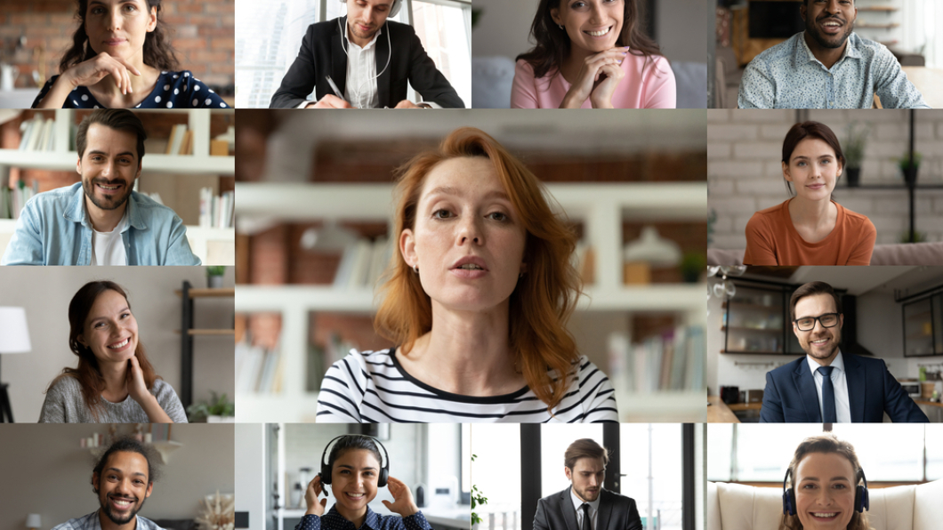 Focused,Young,Red-haired,Female,Employee,Leader,Holding,Video,Conference,Working